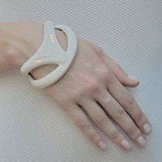 futuristic hospital bracelet- tracks your vitals. Very cool wearable technology