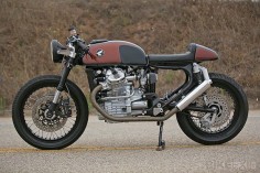 Great looking CX500 (poor man's Moto Guzzi). I love how the rear of the exhaust/pipes bend up matching the lines of the frame. 1980 Honda CX500 custom