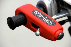Grip-Lock (Red). Easy to Use, Hard to Defeat. Security lock for motorcycles, ATVs, snowmobiles and more.