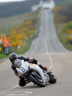 Guy Martin. If you have never heard of him, watch TT3D. It will make you want to buy a bike and go to the Isle of Man.