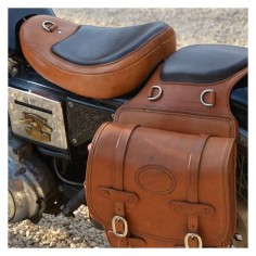handmade saddlebags and custom made seat from full grain saddle leather.