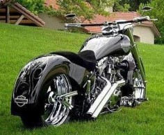 HD custom.    This is almost making me wanna keep mine straight up black. No pink!  Naw. There's gotta be some girly girl on my bike!!