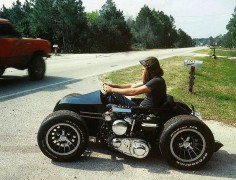 How sick is this, the dude sits in a 1936 side car, with the engine offset to the left. Badass