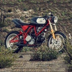 “I wanted to recreate the feel of a 1960s Ferrari, or the Chevys that I grew up with,” says custom motorcycle builder Michael Woolaway of Deus Ex Machina. “When you opened up the hood, all you found was a motor, coils, distributor, and a battery. Just what you need, and no more.”