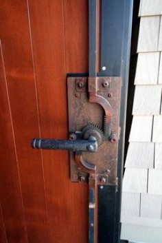 Love this door locking mechanism. Great looking. Functional.