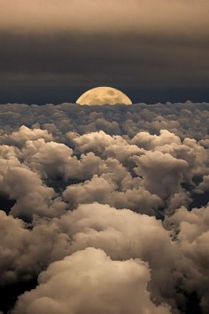 Moon over the clouds | Photography by Victor Caroli