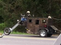 Motorcycle Stage Couch with a little kick. I could go West in that. Would make one heck of a get away camper for weekend outings. I love any custom trike or chopper.