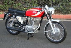 My first bike, Ducati 250 Mach 1. Not as beautifully restored as this one but fast, fun and nimble.