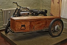 Norton Motorcycle and side coffin at the Norfolk Rural Life Museum. Possibly the oldest motorcycle hearse.