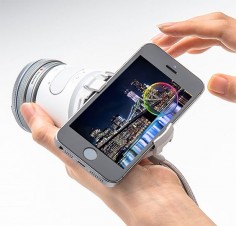 Olympus AIR - Olympus just unveiled the AIR Camera, a handheld interchangeable lens camera completely controlled with smartphones. Olympus wedged the mirrorless, wi-fi & Bluetooth-enabled, 16-megapixel camera—its sensor, storage, battery, & camera functio