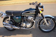 Owned a '74 Honda 750 K4 just like this to replace my Kawasaki H1 Mach III  tripple.  Picked it up new  from the dealer and drove it home in the rain.  Later added a 4 into 1 Kerker exhaust, better tires, a cafe seat, and lower bars and it became a good performing commuter bike that kept me happy.