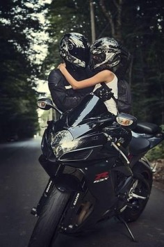 RE-PIN THIS! GSXR love- a couple embraces, staring at each other through their visors. They clearly know that the view is always better from inside a