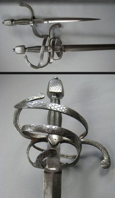 Spade (2)Rapier and Left-hand Dagger Dated: circa 1600 Culture: German Sword, rapier, with left hand (Looks like a snake)