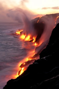 Starting at Kalapana, Hawaii you can walk for two hours to the place on the coast where active lava flows touch the ocean. This is insane.