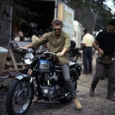 Steve McQueen on his Triumph Bonneville on the set of The Great Escape, Bavaria Film studios, South of Munich, May 1962.