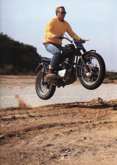 Steve McQueen on his Triumph near Mulholland Drive, Hollywood Hills, 1963.