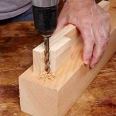 Straight-Up Drill Guide - To bore a perfectly perpendicular hole, you need either a drill press or a couple of scraps of wood screwed together. The corner created by the scraps will steer the bit straight in every time. But if you’re looking for an excuse to buy a drill press, forget you ever saw this tip.