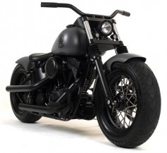 The “Black Tonal Conspiracy" by Russell Mitchell. A mean & moody matte black Bobber.
