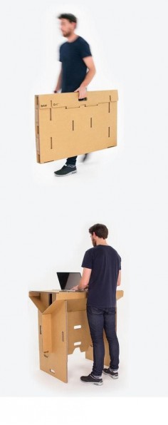 The cardboard standing desk can be folded up and carried
