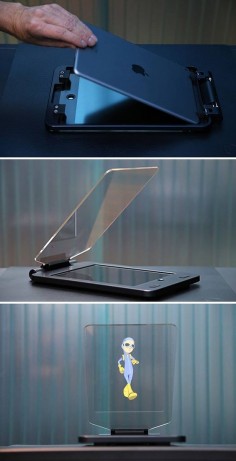 The first of its kind, the Holocube HC Tablet turns your iPad Air 2 into a holographic projector you can use at home. Its magic lies in a transparent synthetic mirror with a solid hinge at a 45 degree angle that captures moving media on the screen, projecting it into thin air. Hit the link to watch it in action!