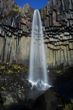 The tall waterfall at Svartifoss - Iceland