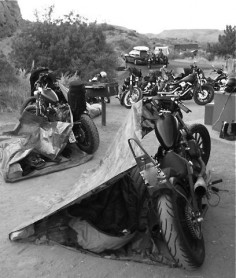 "There's a little Hot Spring outside Panaca, Nevada, where I went one morning to go swimming and there were a ton of bikers camping there, - it looked just like this - they were shooting guns and two of them got in a fight (the loser, a huge bearded biker, cried afterwards while two other bikers consoled him.) Sweet Anarchy."