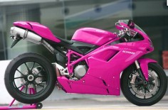 This is a hot pink Ducati crotch rocket!