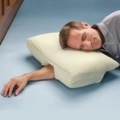 This is so  Arm Sleepers Pillow - Hammacher Schlemmer
