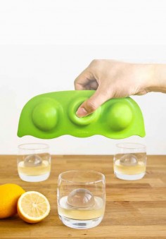 This pea pod ice mold makes gorgeous ice globes that keep cocktails cold and classy.