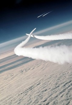 Two Soviet MiG-29 aircraft en route to an air show in British Columbia, Canada, are intercepted by  Air Force F-15 Eagle aircraft of the 21st Tactical Fighter Wing Aug. 1, 1989. DoD photo by Master Sgt. Kevin L Bishop,  Air Force.