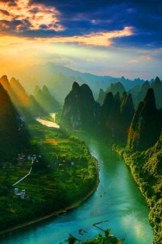 vacationinparadise: Watching the sunrise from the top of Mount Xiang Gong (Guilin of China). Sunrise by Tian Ma