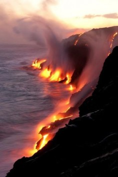 Where fire & water  6 miles southwest of Kalapana on Big Island, Hawaii, USA.