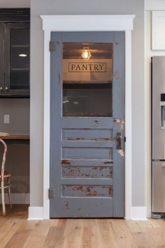 A basement door with glass or character would be neat. Could make the hallway seem more open and add something unexpected.