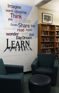 A mural in the High School Resource Centre by Alum Zachary Cartman '08 inspires students.