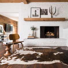Add some southwestern flavor to your family room or den with this country-style contemporary beige rug. Made from machine-woven acrylic blends, this rustic design features a cowhide animal print and is designed to complement multiple color schemes.