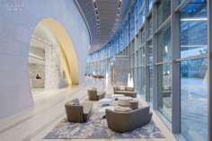 An asymmetrical arch—clad in limestone and accented by Italian marble—ushers guests to the reception area of the new West Tower of the Grand Hyatt in Incheon, South ...
