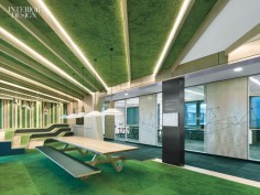 Architects Channel Vibrant City Parks to Create the Perfect Indoor Work Environment | Nylon carpet tile appears on the floor, the ceiling, a wall, and built-in birch seating. #interiordesign #design #interiordesignmagazine #projects #officespaces