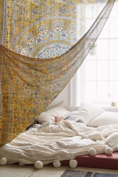 Bohemian bedroom. Beautiful scarf for door way