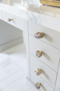 Cabinet knobs are the Crowned Quartz Knob by Anthropologie.  Alice Lane Home.