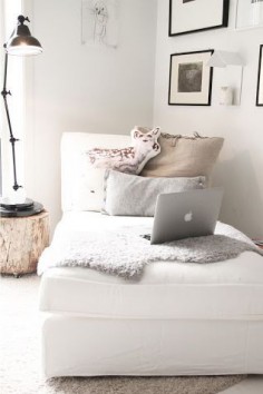 Cozy chaise reading nook. Sheepskin, pillows, reading lamp, and of course, a Macbook. ❋
