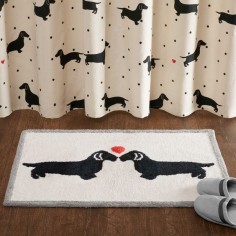 Create an eye-catching look in your bedroom with the HipStyle Hannah Collection. This unique dachshund design is featured on 100 percent cotton tufted fabrication for a textured look and feel. These two lovable dogs are sure to update your space.