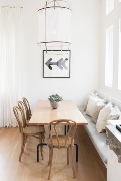 DINING: gorgeous monochrome dining space with timber table and timber bentwood chairs + built in bench seat