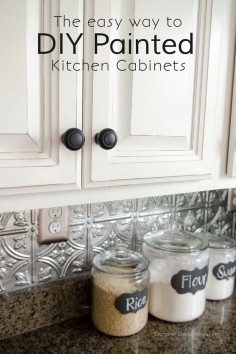 DIY Painted Kitchen Cabinets tutorial :: NO prep, no sanding, no priming. Yes please! Plus the easiest backsplash to install and maintain. Awesome Kitchen makeover.