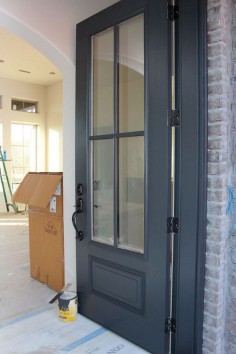 Door painted in Benjamin Moore Wrought Iron. One of the best dark door and trim colors. #BenjaminMooreWroughtIron Timeless Paper.