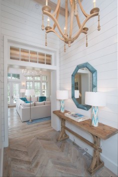 Flooring is a reclaimed oak floor that the designer mixed up a custom white wash stain. Interiors by Courtney Dickey of TS Adams Studio.