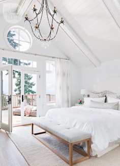 gorgeous white bedroom. love the pillows and that gray and wood bench