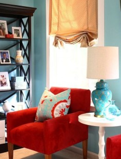 Great room makeover with red and turquoise throw pillow as accent