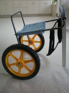 Home-made dog wheelchair= looks like we may need this. How great that someone tested and shared their design. Turns out the custom made ones aren't cheap.