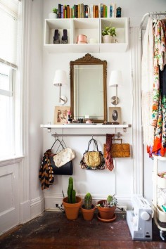 hooks on the hanging rod below keep purses neatly organized -- Ideas to Steal from 10 Clever Small Space Entryways