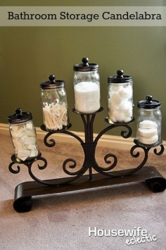 Housewife Eclectic: Bathroom Storage Candelabra. This idea is perfect for storage and decor in your bathroom!